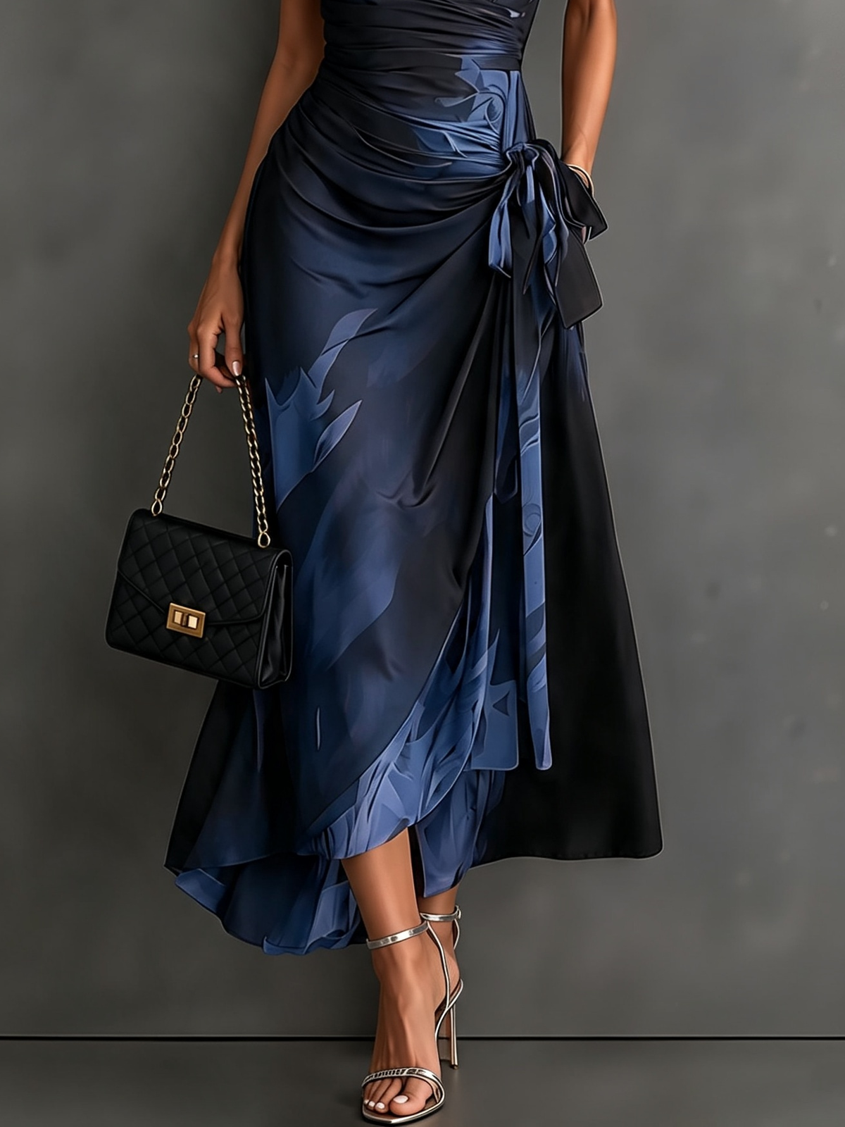 Marceline - Robe portefeuille mi-longue à imprimé abstrait rouge et noir, col chemisier, manches courtes, taille nouée et ourlet asymétrique à volants
