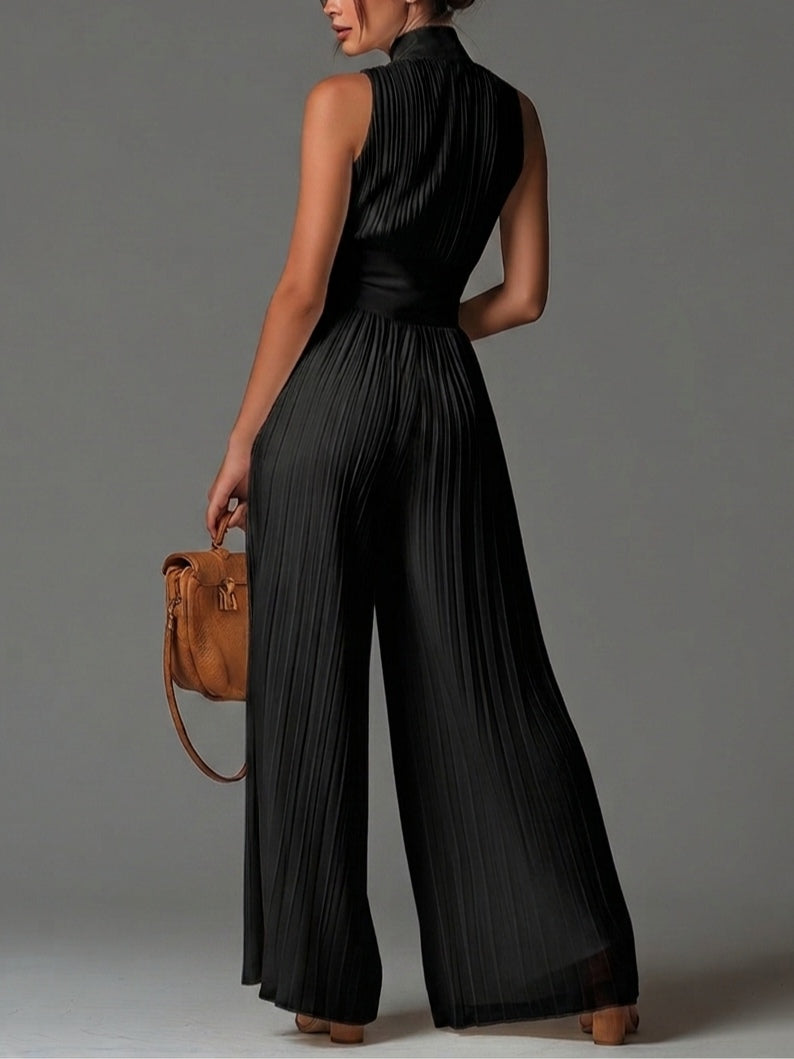 Combinaison sans manches à col en V noir avec zip et plis, jambes larges en chiffon