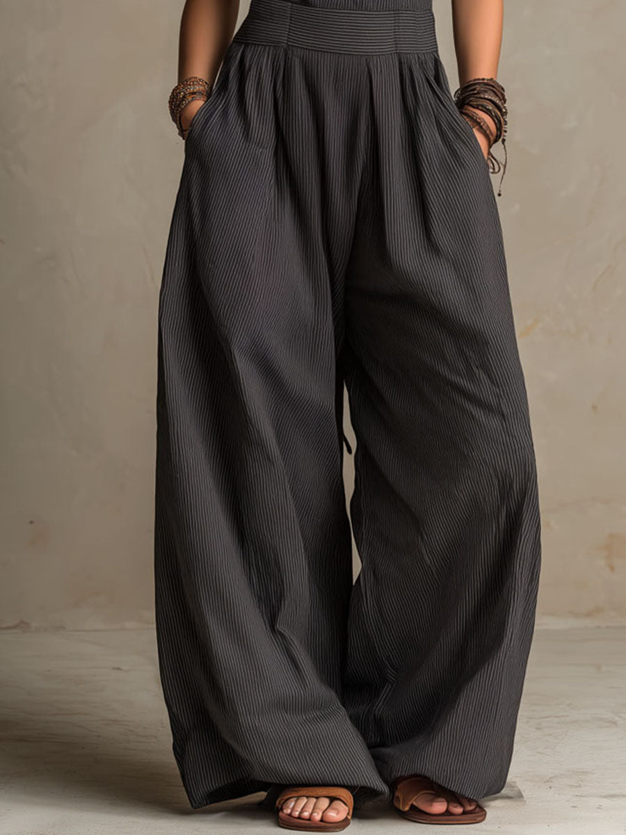Raymonde | Combinaison large à rayures verticales en charbon Boho avec décolleté croisé