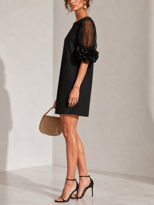 Fabienne - Robe courte en organza noir à manches bouffantes et poignets fleuris spectaculaires