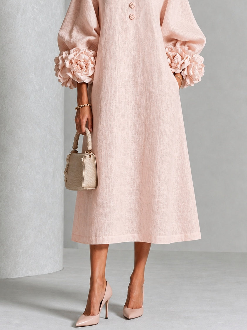 Rosine - Robe mi-longue boutonnée à imprimé floral rose et poignets fleuris spectaculaires