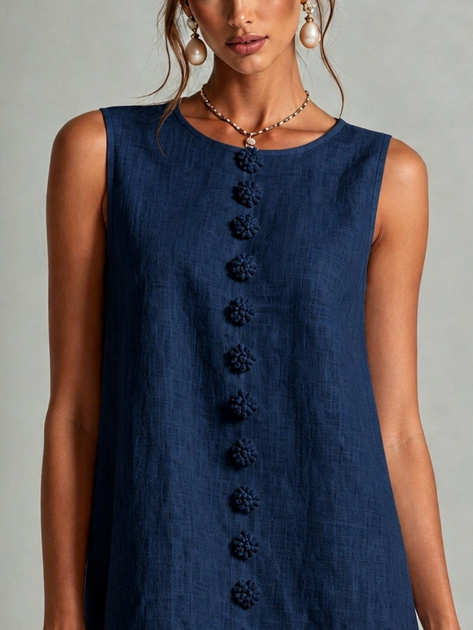 Clotilde - Robe courte sans manches à imprimé floral bleu marine et boutons fleuris